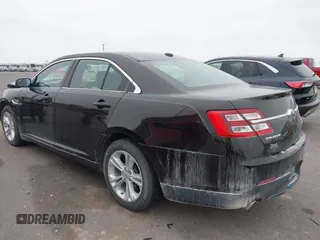 2014 Ford Taurus SEL z VIN 1FAHP2E85EG121636, wystawiony jako IAAI lot #41036886 z przebiegiem 117 460 mil mil oraz . Historia ofert i sprzedaży dostępna na DreamBid. Obrazek 3.