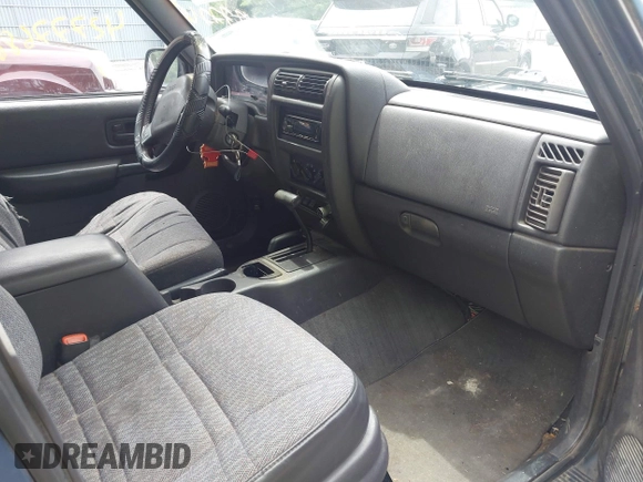 1999 Jeep Cherokee Sport with VIN 1J4FF68S3XL608860, listed as a IAAI auction lot 42777688 with 248,505 mi miles and . Bid and sale history available at DreamBid. Image 5.