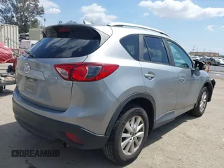 2014 Mazda CX-5 Touring z VIN JM3KE2CYXE0322943, wystawiony jako IAAI lot #41934670 z przebiegiem 110 690 mil mil oraz . Historia ofert i sprzedaży dostępna na DreamBid. Obrazek 4.