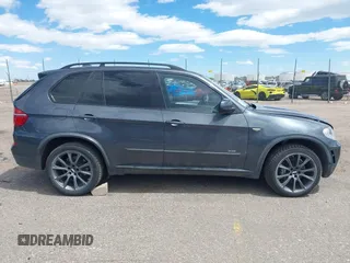 2012 BMW X5 35i z VIN 5UXZV4C53CL987556, wystawiony jako IAAI lot #42297756 z przebiegiem 190 922 mil mil oraz . Historia ofert i sprzedaży dostępna na DreamBid. Obrazek 13.