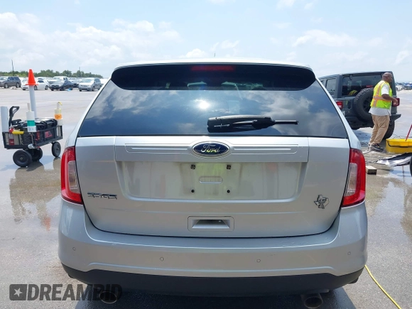 2013 Ford Edge SE with VIN 2FMDK3GC0DBE33153, listed as a IAAI auction lot 42366900 with 130,894 mi miles and . Bid and sale history available at DreamBid. Image 16.