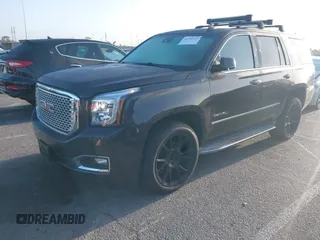 2015 GMC Yukon Denali z VIN 1GKS1CKJ7FR566419, wystawiony jako IAAI lot #41948825 z przebiegiem 235 037 mil mil oraz . Historia ofert i sprzedaży dostępna na DreamBid. Obrazek 17.