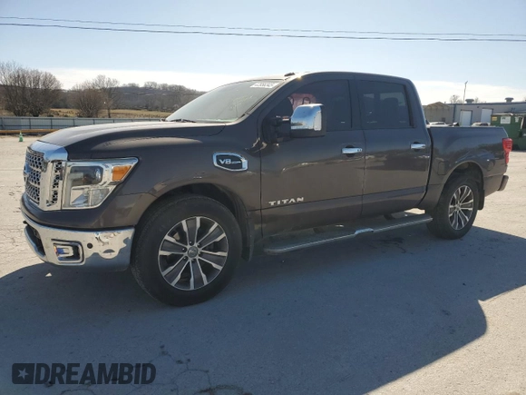 2017 Nissan Titan SL with VIN 1N6AA1E6XHN536809, listed as a Copart auction lot 47956345 with 135,207 mi miles and Salvage title. Bid and sale history available at DreamBid. Image 1.