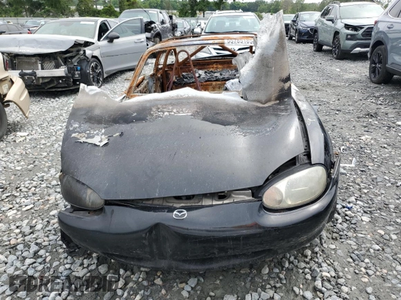 1999 Mazda MX-5 Miata z VIN JM1NB3535X0131701, wystawiony jako Copart lot #55785185 z przebiegiem Nie podano mil oraz Nie do naprawy • Non repairable. Historia ofert i sprzedaży dostępna na DreamBid. Obrazek 5.