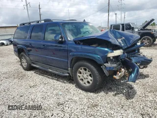 2006 Chevrolet Suburban Z71 with VIN 1GNFK16Z16J171303, listed as a Copart auction lot 61349645 with 158,488 mi miles and Salvage title. Bid and sale history available at DreamBid. Image 4.