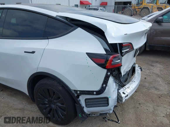2023 Tesla Model Y Long Range with VIN 7SAYGAEEXPF776370, listed as a IAAI auction lot 42127512 with 27,120 mi miles and . Bid and sale history available at DreamBid. Image 20.