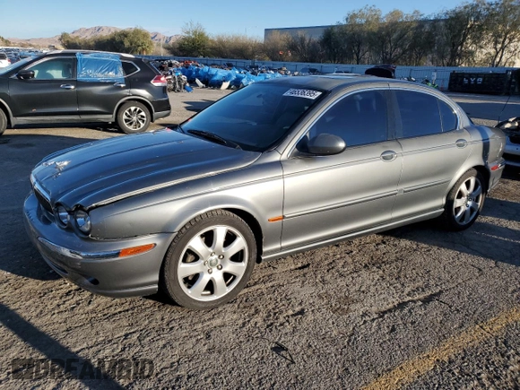2004 Jaguar X-Type with VIN SAJEA51C74WD70684, listed as a Copart auction lot 46536395 with 155,184 mi miles and Salvage Title. Bid and sale history available at carsss.com. Image 1.