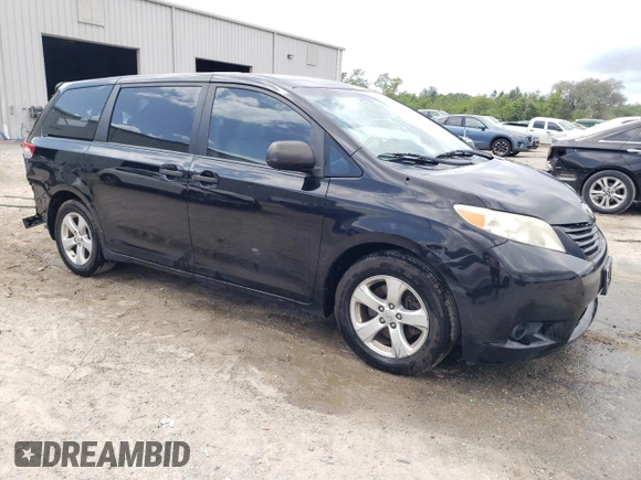 2014 Toyota Sienna L with VIN 5TDZK3DC3ES514520, listed as a Copart auction lot 52205295 with 71,402 mi miles and Salvage Title. Bid and sale history available at carsss.com. Image 4.