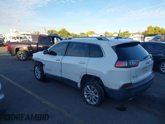 2019 Jeep Cherokee Latitude with VIN 1C4PJMCX0KD104155, listed as a IAAI auction lot 40647860 with 125,802 mi miles. Bid and sale history available at carsss.com. Image 3.