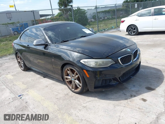 2014 BMW 2 Series M235i with VIN WBA1J7C50EVW84072, listed as a IAAI auction lot 41917841 with 102,745 mi miles and . Bid and sale history available at carsss.com. Image 1.