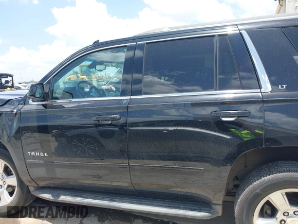 2016 Chevrolet Tahoe LT with VIN 1GNSCBKC0GR266750, listed as a IAAI auction lot 42548347 with 113,693 mi miles and . Bid and sale history available at DreamBid. Image 14.