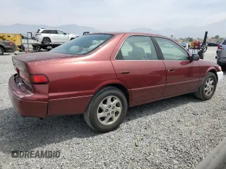 1999 Toyota Camry LE z VIN JT2BF22K8X0181675, wystawiony jako Copart lot #55057875 z przebiegiem 184 657 mil mil oraz Szkoda całkowita • Salvage title. Historia ofert i sprzedaży dostępna na DreamBid. Obrazek 3.