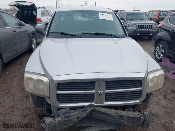 2005 Dodge Dakota Laramie with VIN 1D7HE58N05S244878, listed as a IAAI auction lot 41662513 with 171,323 mi miles. Bid and sale history available at carsss.com. Image 12.