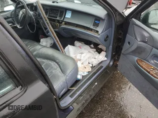 1997 Lincoln Town Car Executive z VIN 1LNLM81W7VY720905, wystawiony jako Copart lot #85910534 z przebiegiem Nie podano mil oraz Szkoda całkowita • Salvage title. Historia ofert i sprzedaży dostępna na DreamBid. Obrazek 8.