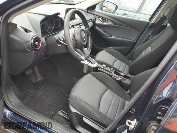 2018 Mazda CX-3 Sport z VIN JM1DKFB79J1323497, wystawiony jako Copart lot #56168875 z przebiegiem 60 284 mil mil oraz Szkoda całkowita • Salvage title. Historia ofert i sprzedaży dostępna na DreamBid. Obrazek 7.