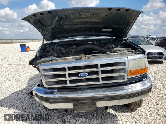 1995 Ford F-150 with VIN 1FTEF14H7SLA85317, listed as a Copart auction lot 70357313 with 269,095 mi miles and Salvage Title. Bid and sale history available at carsss.com. Image 5.