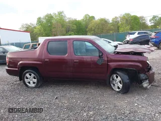 2010 Honda Ridgeline RTL with VIN 5FPYK1F57AB005602, listed as a IAAI auction lot 42208633 with 106,777 mi miles and . Bid and sale history available at DreamBid. Image 13.