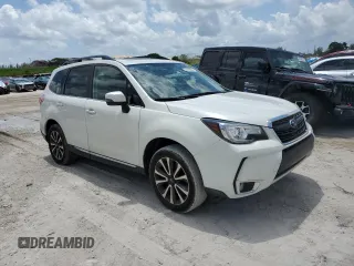 2017 Subaru Forester Touring with VIN JF2SJGWC2HH594766, listed as a Copart auction lot 50199083 with 51,189 mi miles and . Bid and sale history available at DreamBid. Image 4.