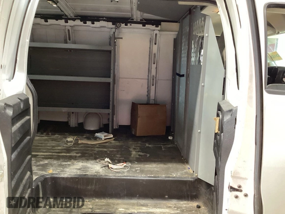 2017 Chevrolet Express Cargo Van with VIN 1GCWGBFF8H1351693, listed as a IAAI auction lot 42143108 with 99,247 mi miles. Bid and sale history available at carsss.com. Image 1.
