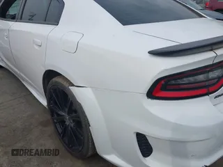 2018 Dodge Charger R/T with VIN 2C3CDXCT9JH265601, listed as a IAAI auction lot 41979466 with 107,842 mi miles and . Bid and sale history available at DreamBid. Image 21.