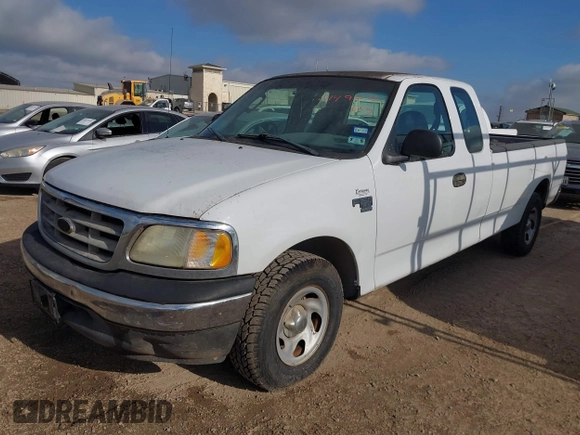 2002 Ford F-150 XL with VIN 1FTRX17W82NB78988, listed as a IAAI auction lot 41490173 with 1 mi miles. Bid and sale history available at carsss.com. Image 2.