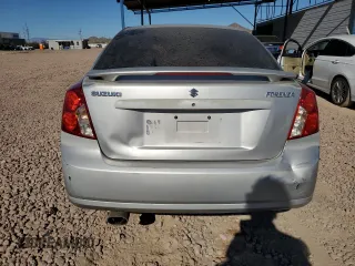 2006 Suzuki Forenza Premium z VIN KL5JJ56Z36K268290, wystawiony jako Copart lot #88509495 z przebiegiem 199 303 mil mil oraz Szkody całkowita. Historia ofert i sprzedaży dostępna na DreamBid. Obrazek 6.