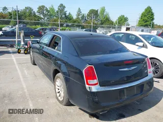 2014 Chrysler 300 with VIN 2C3CCAAG4EH252864, listed as a IAAI auction lot 42056787 with 185,063 mi miles. Bid and sale history available at carsss.com. Image 3.