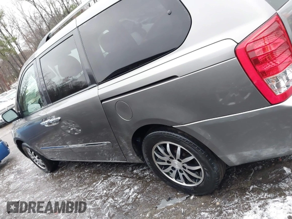 2011 Kia Sedona EX with VIN KNDMH4C71B6396661, listed as a IAAI auction lot 41412771 with 175,192 mi miles. Bid and sale history available at carsss.com. Image 14.