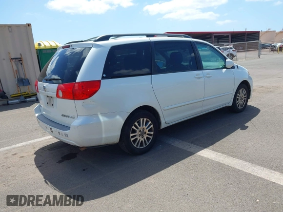 2010 Toyota Sienna XLE with VIN 5TDYK4CC7AS291119, listed as a IAAI auction lot 41742917 with 201,590 mi miles. Bid and sale history available at carsss.com. Image 4.