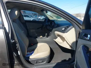 2014 Kia Optima EX with VIN 5XXGN4A72EG275751, listed as a IAAI auction lot 41807589 with 197,461 mi miles. Bid and sale history available at carsss.com. Image 5.