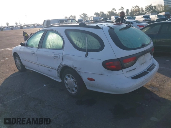 1998 Mercury Sable LS z VIN 1MEFM55U1WG608826, wystawiony jako IAAI lot #41433046 z przebiegiem 138 291 mil mil oraz . Historia ofert i sprzedaży dostępna na DreamBid. Obrazek 3.
