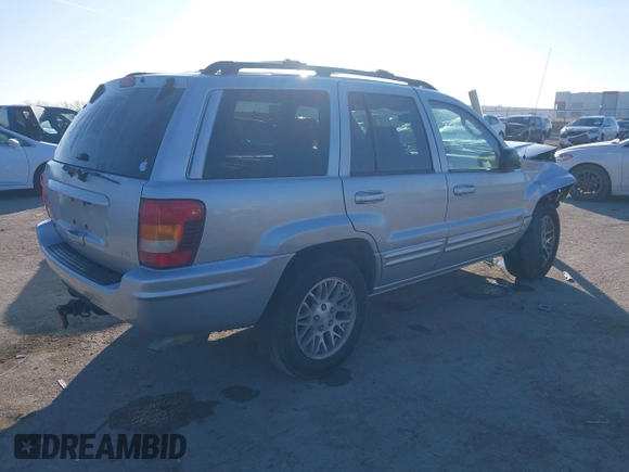 2004 Jeep Grand Cherokee Limited with VIN 1J8GX58N44C416699, listed as a IAAI auction lot 41134510 with 129,532 mi miles and . Bid and sale history available at DreamBid. Image 4.