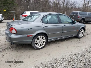 2004 Jaguar X-Type with VIN SAJEA51C24WE00125, listed as a Copart auction lot 49161875 with 80,890 mi miles and Clean Title. Bid and sale history available at DreamBid. Image 3.