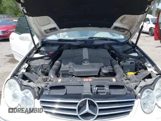 2005 Mercedes-Benz CLK 5.0L with VIN WDBTK75J55F123328, listed as a IAAI auction lot 42082590 with 58,969 mi miles. Bid and sale history available at carsss.com. Image 10.