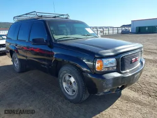 1999 GMC Denali with VIN 1GKEK13R4XR904086, listed as a IAAI auction lot 42034848 with 169,847 mi miles. Bid and sale history available at carsss.com. Image 1.