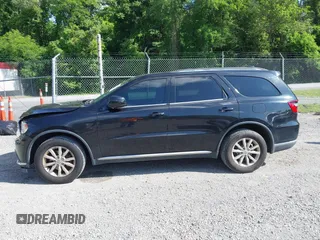 2015 Dodge Durango SXT with VIN 1C4RDJAG4FC795963, listed as a IAAI auction lot 42457196 with 161,800 mi miles and . Bid and sale history available at DreamBid. Image 14.