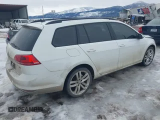 2015 Volkswagen Golf SportWagen TDI SE with VIN 3VWCA7AU0FM506614, listed as a IAAI auction lot 41552304 with 119,209 mi miles. Bid and sale history available at carsss.com. Image 4.
