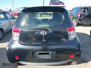 2012 Scion iQ with VIN JTNJJXB02CJ018324, listed as a IAAI auction lot 41692406 with 162,445 mi miles. Bid and sale history available at carsss.com. Image 16.