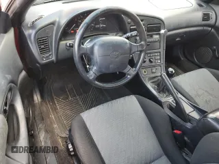 1995 Toyota Celica ST z VIN JT2AT00N7S0042443, wystawiony jako Copart lot #56394475 z przebiegiem 328 515 mil mil oraz Szkody całkowita. Historia ofert i sprzedaży dostępna na DreamBid. Obrazek 8.
