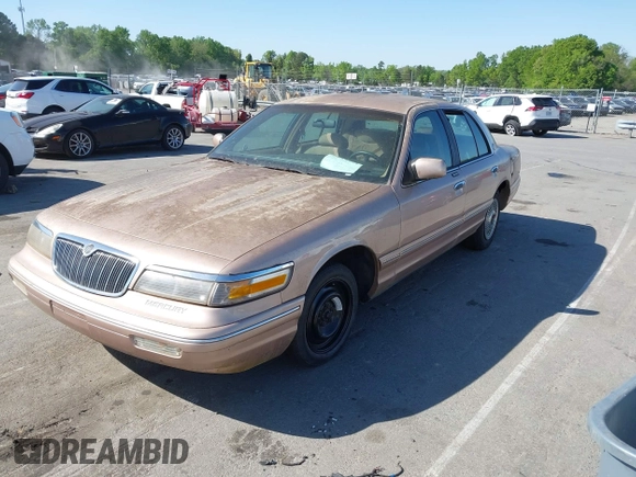 1996 Mercury Grand Marquis GS with VIN 2MELM74W3TX670994, listed as a IAAI auction lot 42052604 with 46,728 mi miles and . Bid and sale history available at DreamBid. Image 2.