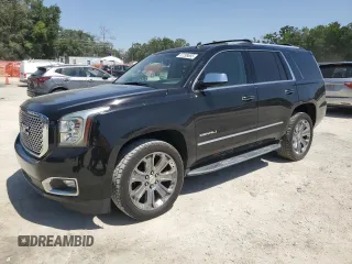 2015 GMC Yukon Denali z VIN 1GKS1CKJ8FR288548, wystawiony jako Copart lot #57299685 z przebiegiem 137 502 mil mil oraz Szkoda całkowita • Salvage title. Historia ofert i sprzedaży dostępna na DreamBid. Obrazek 1.