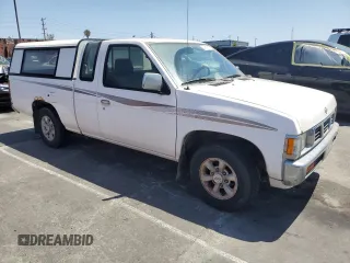1997 Nissan Frontier XE with VIN 1N6SD16S3VC427137, listed as a Copart auction lot 57911575 with 228,542 mi miles and Clean title. Bid and sale history available at DreamBid. Image 4.