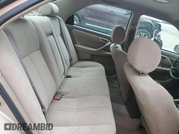 2001 Toyota Camry CE z VIN 4T1BG22K41U104477, wystawiony jako Copart lot #58437155 z przebiegiem 84 355 mil mil oraz Czysty tytuł • Clean title. Historia ofert i sprzedaży dostępna na DreamBid. Obrazek 10.