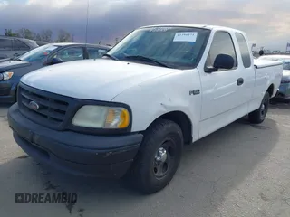 2000 Ford F-150 XL with VIN 1FTZX1727YKA78887, listed as a IAAI auction lot 41291272 with 289,343 mi miles. Bid and sale history available at carsss.com. Image 2.