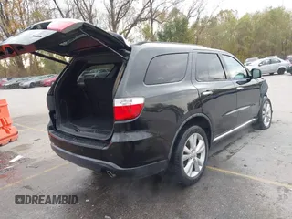 2013 Dodge Durango Crew with VIN 1C4RDHDG8DC592706, listed as a IAAI auction lot 40745114 with 95,757 mi miles and . Bid and sale history available at DreamBid. Image 4.