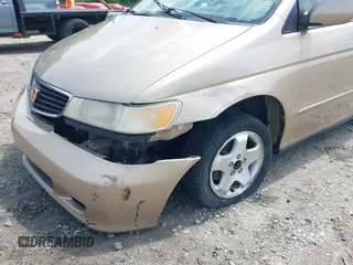 2000 Honda Odyssey EX with VIN 2HKRL1868YH513587, listed as a IAAI auction lot 42092115 with 302,555 mi miles and . Bid and sale history available at DreamBid. Image 6.
