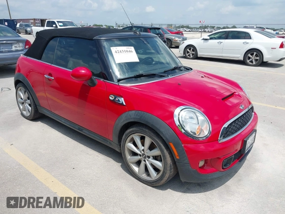 2014 MINI Convertible S z VIN WMWZP3C56ET707702, wystawiony jako IAAI lot #42431046 z przebiegiem 65 726 mil mil oraz . Historia ofert i sprzedaży dostępna na DreamBid. Obrazek 1.