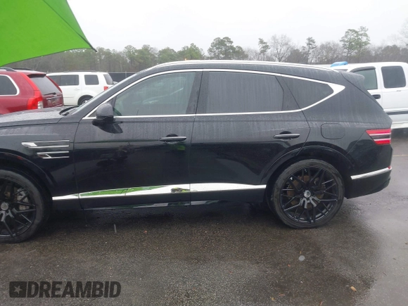 2022 Genesis GV80 with VIN KMUHCESC0NU083778, listed as a IAAI auction lot 41553215 with 93,384 mi miles and . Bid and sale history available at DreamBid. Image 14.