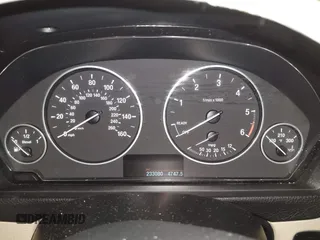 2014 BMW 3 Series 328d with VIN WBA3D3C57EK156586, listed as a IAAI auction lot 41328159 with 233,080 mi miles and . Bid and sale history available at DreamBid. Image 7.