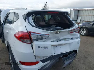 2016 Hyundai Tucson Eco with VIN KM8J3CA23GU192106, listed as a IAAI auction lot 41885799 with 151,781 mi miles. Bid and sale history available at carsss.com. Image 6.